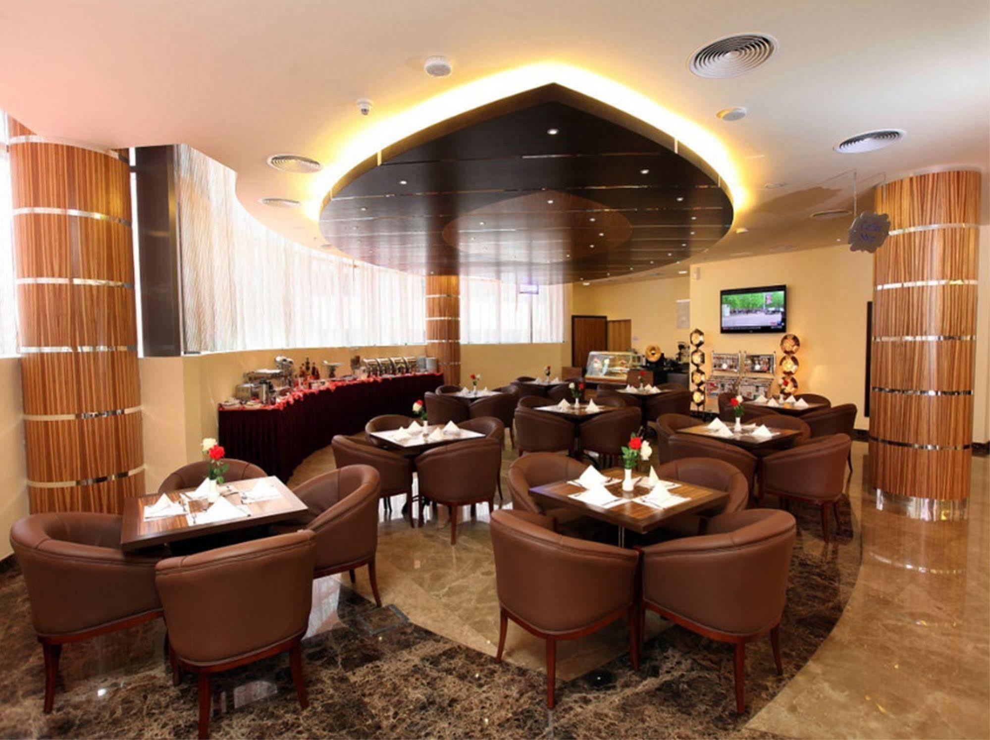 Xclusive Maples Hotel Apartment Dubai Restaurant foto
